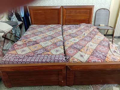 2 single beds with mattress