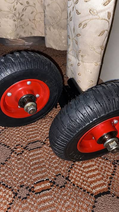 Electric Scooty side support wheels.