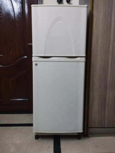 dawlance double door top mount refrigerator