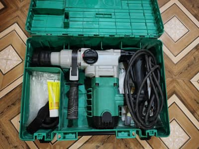 Rotary hammer drill machine