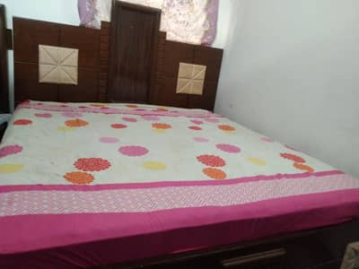 Bed and dressing table
