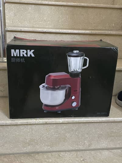 Dough maker with grinder