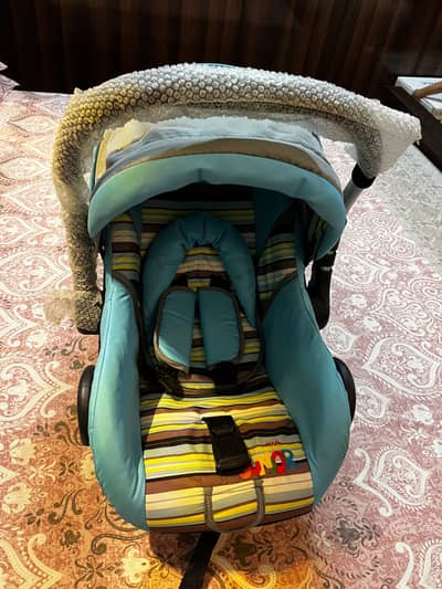 Carry cot car seat