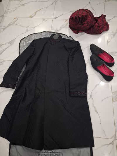 Complete Groom set (Black Sherwani with matching Khussa and Kulla]