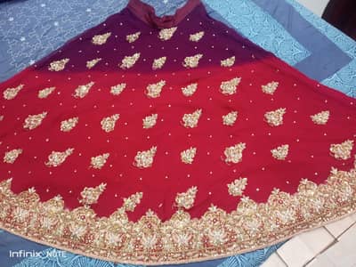 bridal lahnga with pouch and kan kan