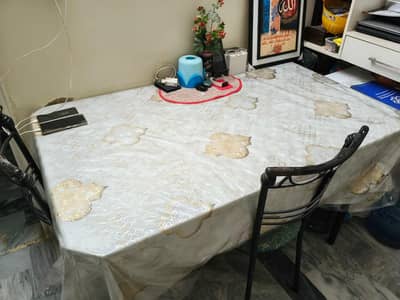 Glass top dinning table with 6 chairs