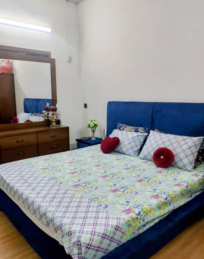 blue king size bed with 2 side tables (upholstered )