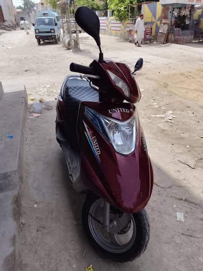 united scooty 100cc