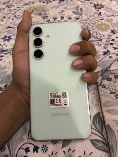 Samsung Mobile S24 fE 11 month in warranty with box pta approved