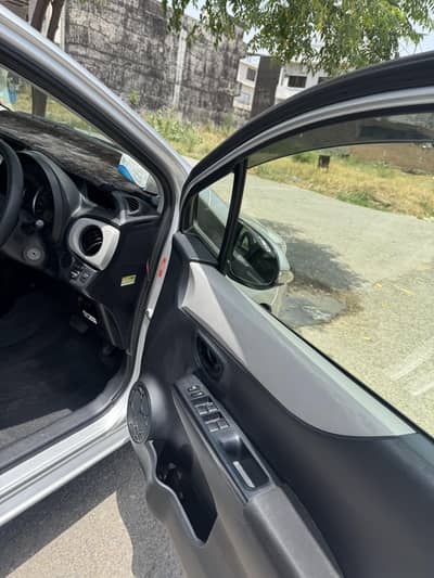 vitz car 2013 model/ 2017  registration minor touching no pain