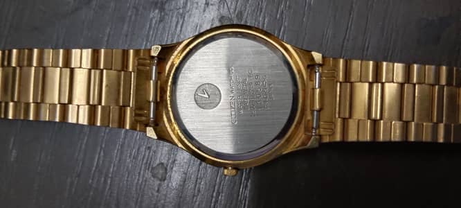 used citizen gold color men's watch in very good condition