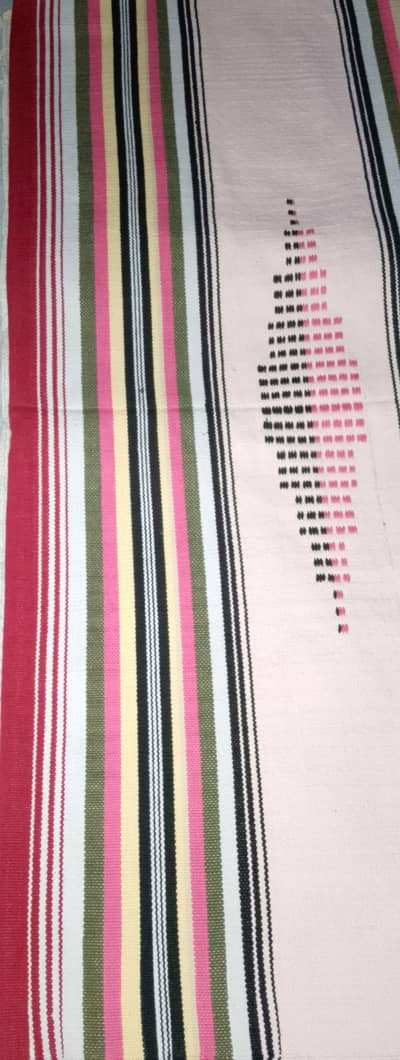 handmade. . . khaddi. . . dari.