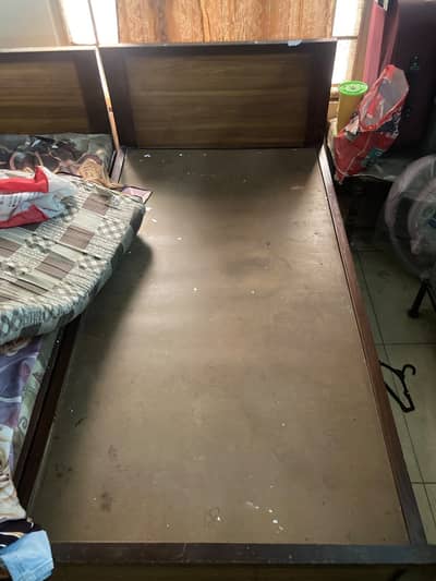 Wooden single bed