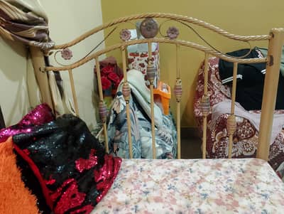 Single bed with spring mattress