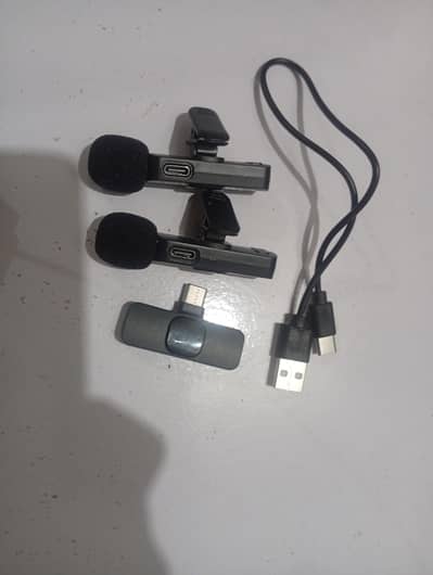 K9 or K8 Wireless Lavalier Microphone set designed for mobile devices.