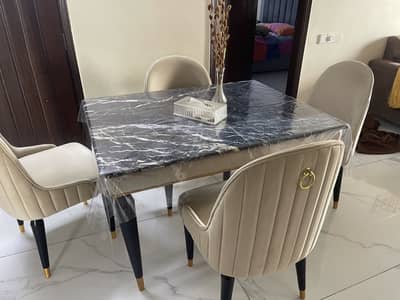 Dining table with four chairs