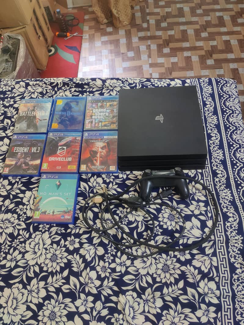 Ps4 pro 1 tb with 7 famous cd 3