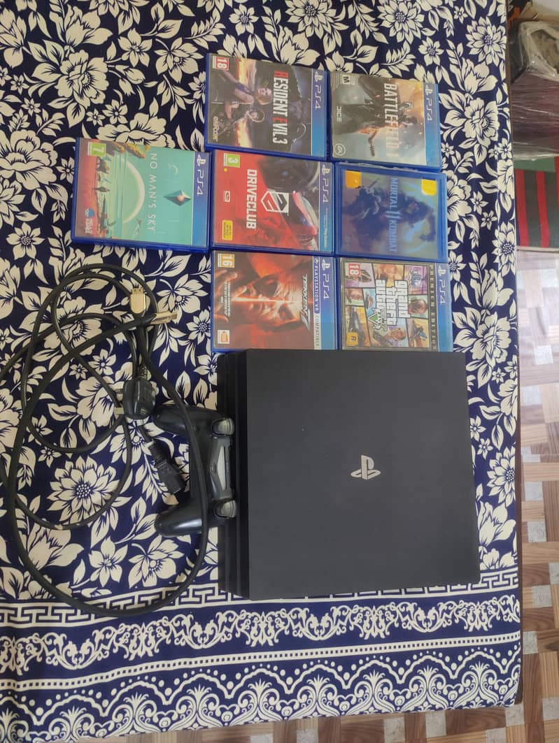 Ps4 pro 1 tb with 7 famous cd 5