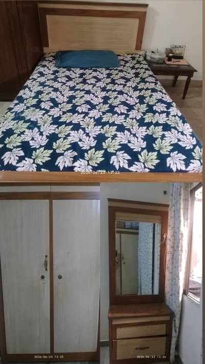 Single bed with wardrobe and dressing table