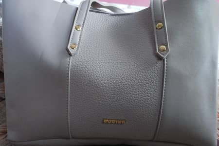 beige colour soft leather ladies handbag