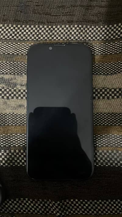 Apple iPhone 13 with original charger