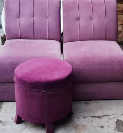 2 sofa chair ek gol table.  ek sal. use huva hai bs.