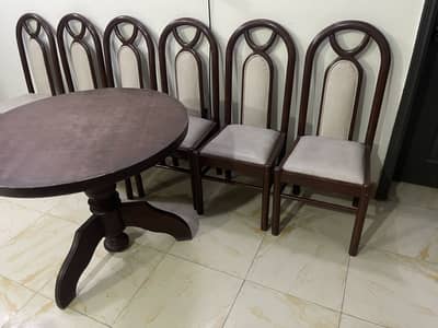 Round table with dining chairs