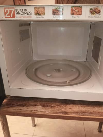 Neat and clean and very less used Dawlance microwave oven for sale