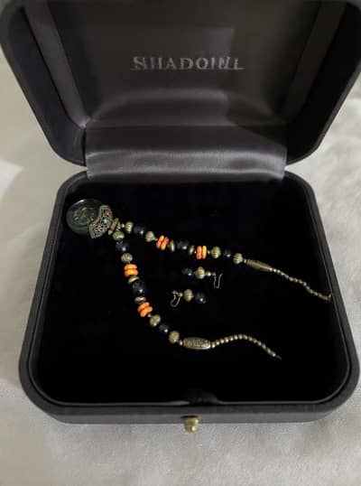 boho style necklace with tops
