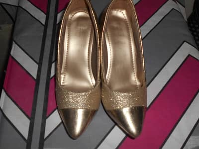 Stylo heels  golden (only 1 time used) Size 38