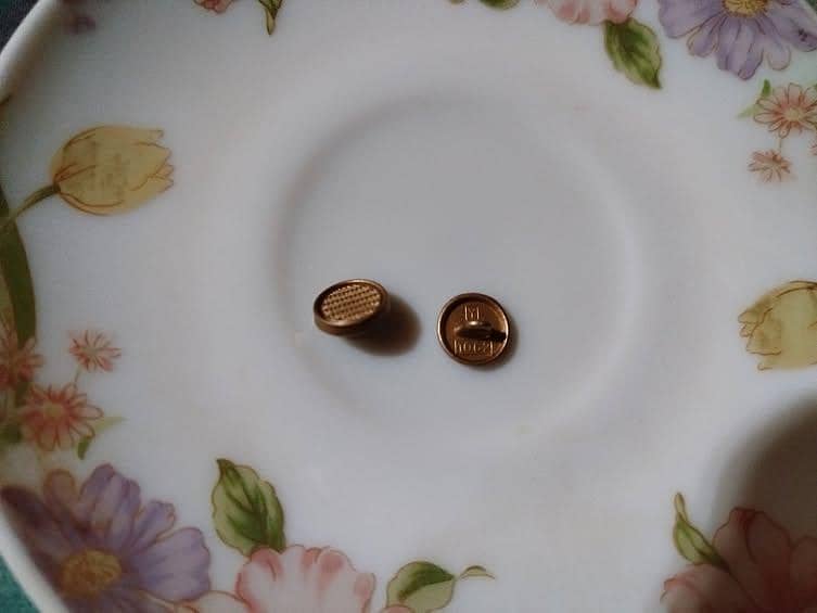kundi button 1