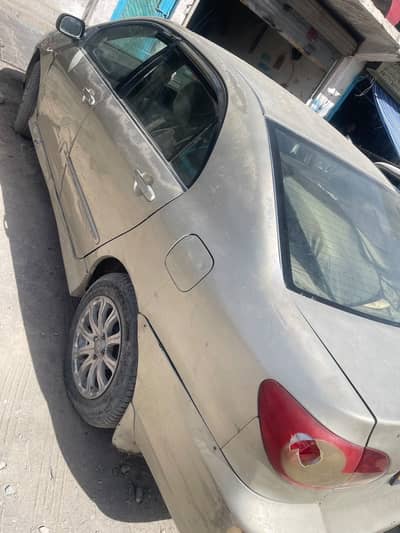 Toyota Corolla Gli convert into Altis