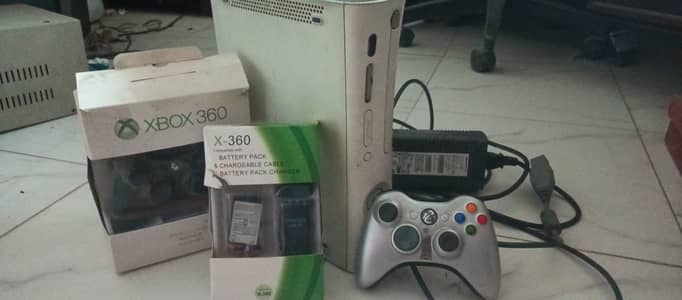 Xbox 360 with new wireless controllers/batteries/chargers and games