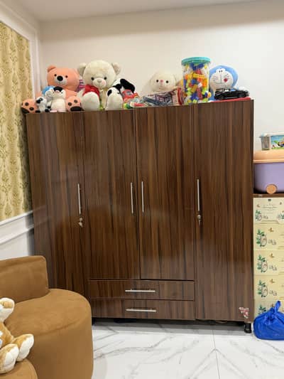 4 door wooden cupboard for sale . . very good in condition very useful