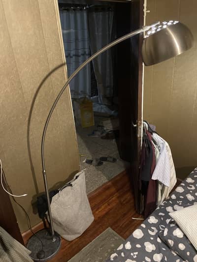 Curved standing lamp.