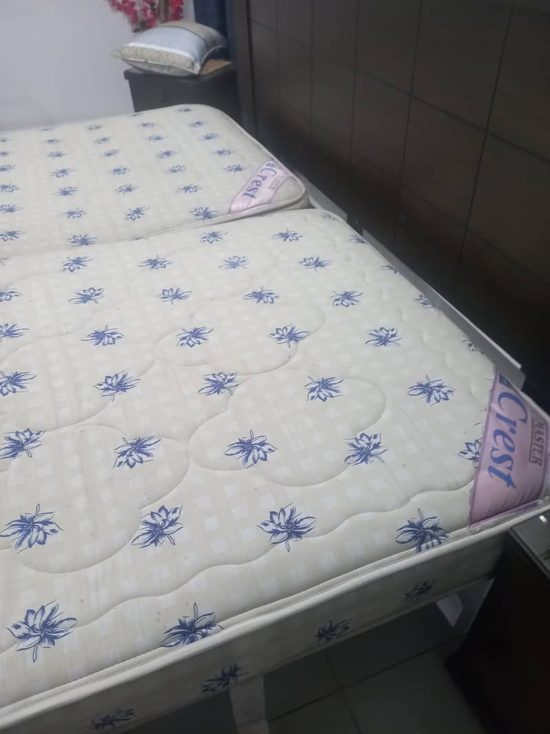 Two single bed mattresses 0