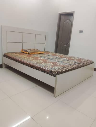 Double bed and kids wardrobe