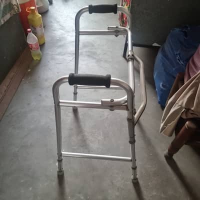 Folding/adjustable walker