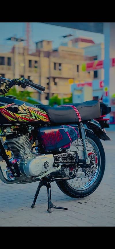 125 Islamabad number brand new condition 10/9.5 bike
