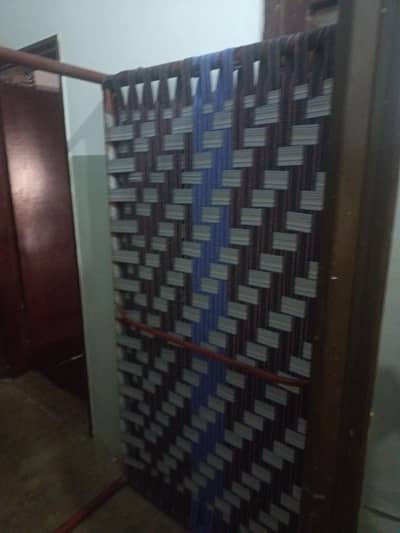 Iron bed. munjhi