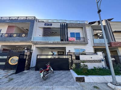 *8 Marla Luxury House For Sale In Faisal Town Islamabad- Your Dream Lome Awaits!*Located In A Premium Gated Society With_all Modern Amenities_, This Stunning 8 Marla Residence Is Priced At *Rs:3.60Cr* -