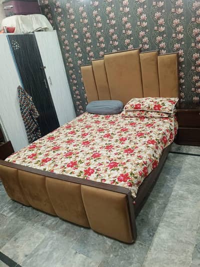 Bed with side tables and dressing table
