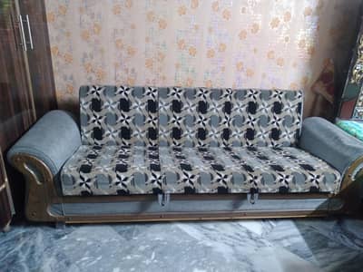 Grey color sofa combed This convertible sofa combed 1 year use bed