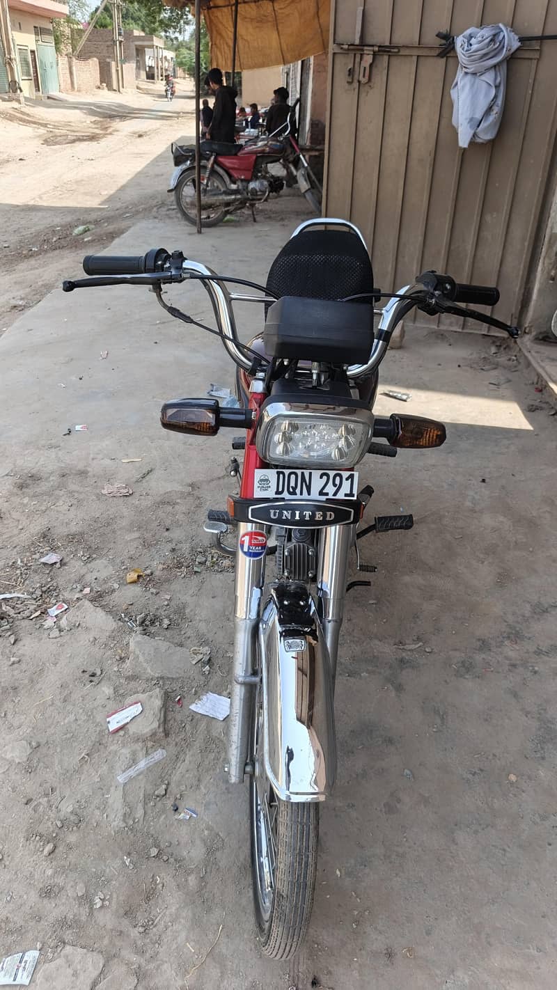 United 70cc 3