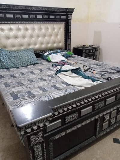 Bed set a show case and center table