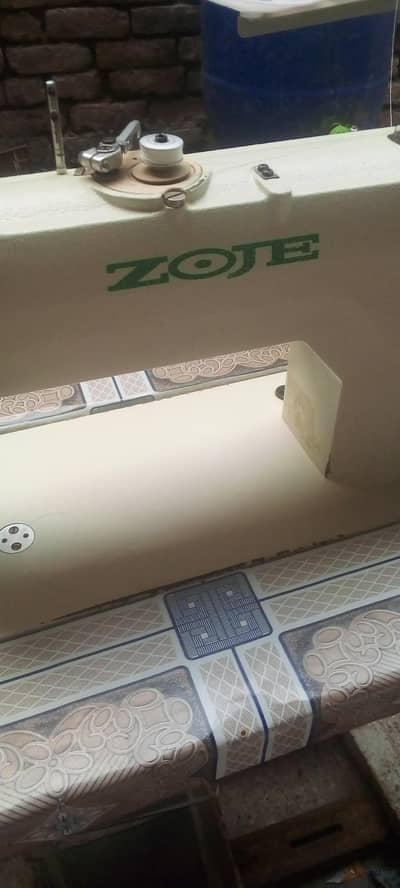 zoje Sewing machine