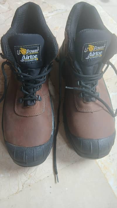 U. Power branded shoes.