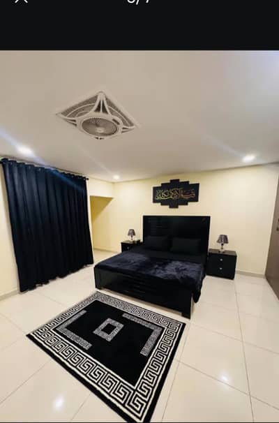 Par Day and short Time One and Two BeD Room appaertment Available Bahria Town Phase 4 and 6 Empire Heights 2 family apartment any time available