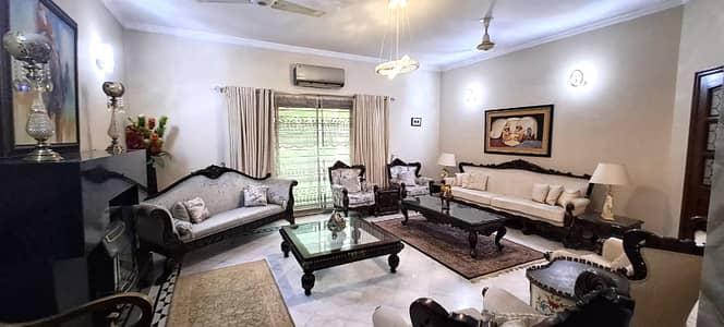 One Kanal Used Modern Design Bungalow For Sale At Prime Location Of DHA Lahore Near To Park Masjid & Commercial Market.