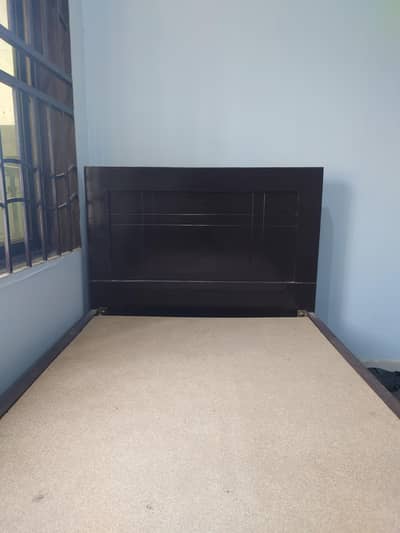 Single wooden bed